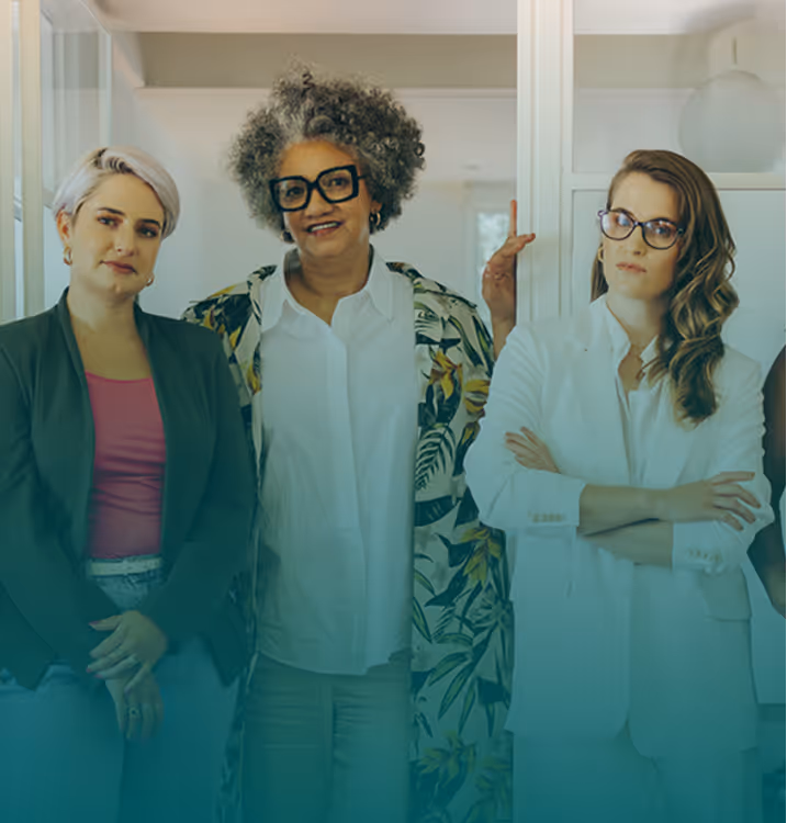 Five women standing together